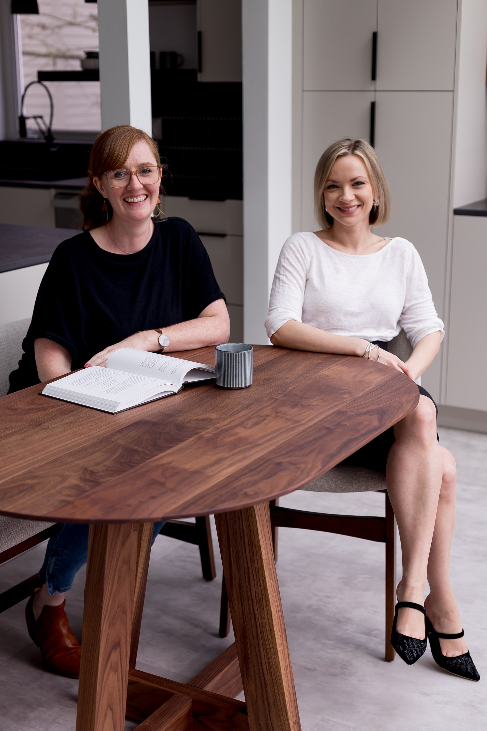Interior designer Jen Orr and Anna from ARKA Cabinets discussing the kitchen design