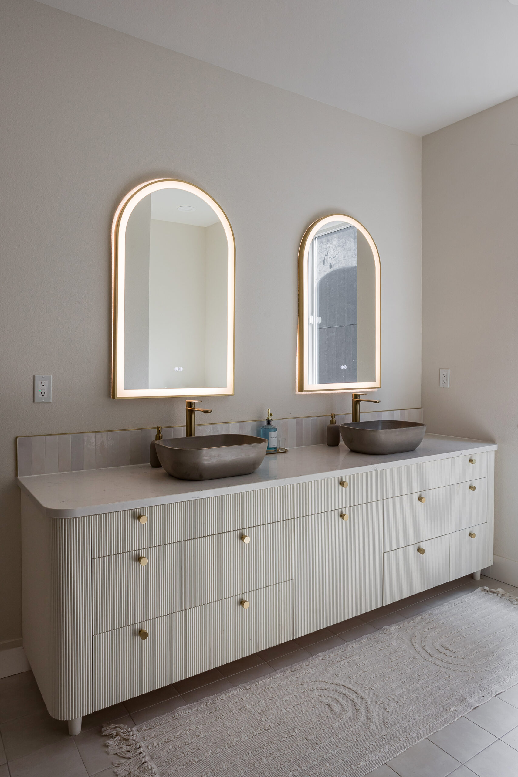 Paint grade cabinets with round reeded front and 3"R front corners